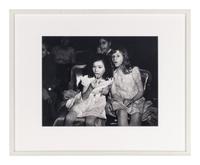 Weegee (1899-1968) Palace Theatre, New York City (Two girls with lollipops), 1950s