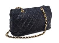A Chanel Black Distressed Leather Quilted Handbag, 12" x 8" x 4".