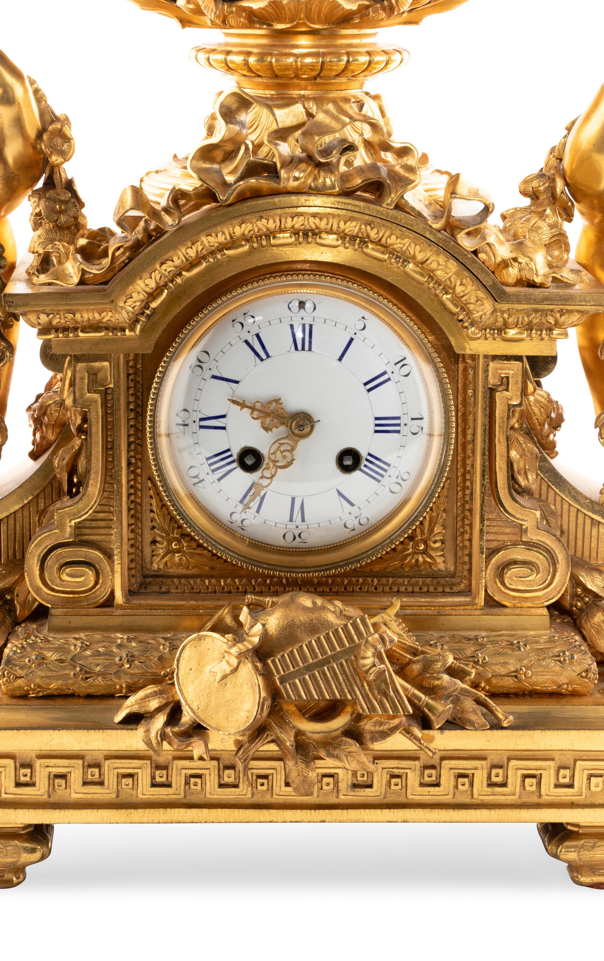 A French Gilt Bronze and Sèvres Style Porcelain Clock