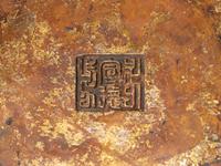 A Chinese Gold-Splashed Bronze Incense Burner and Stand