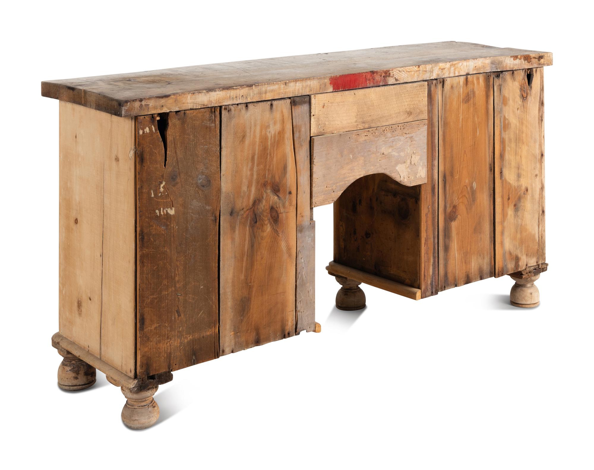An English Pine Kneehole Dresser