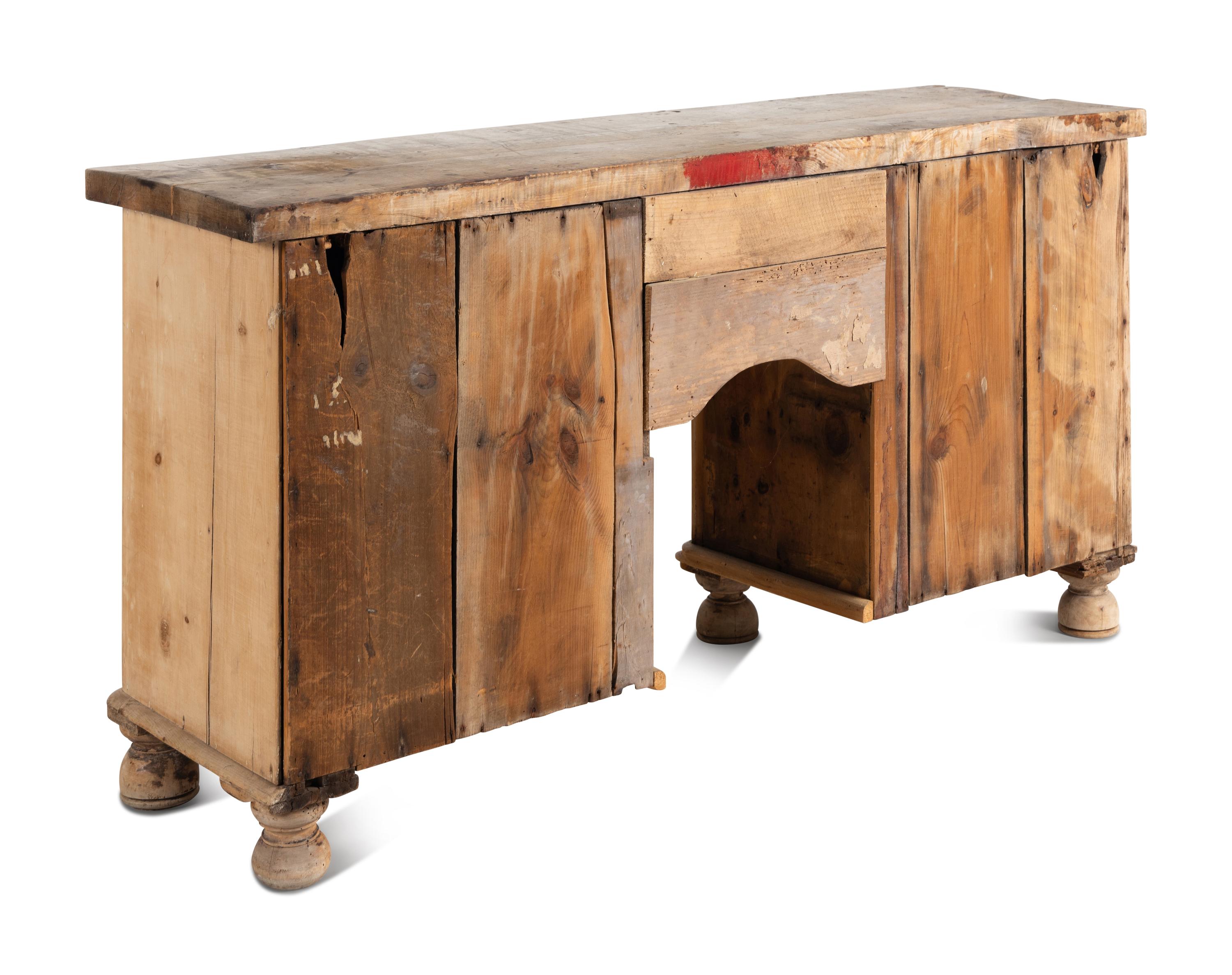 An English Pine Kneehole Dresser