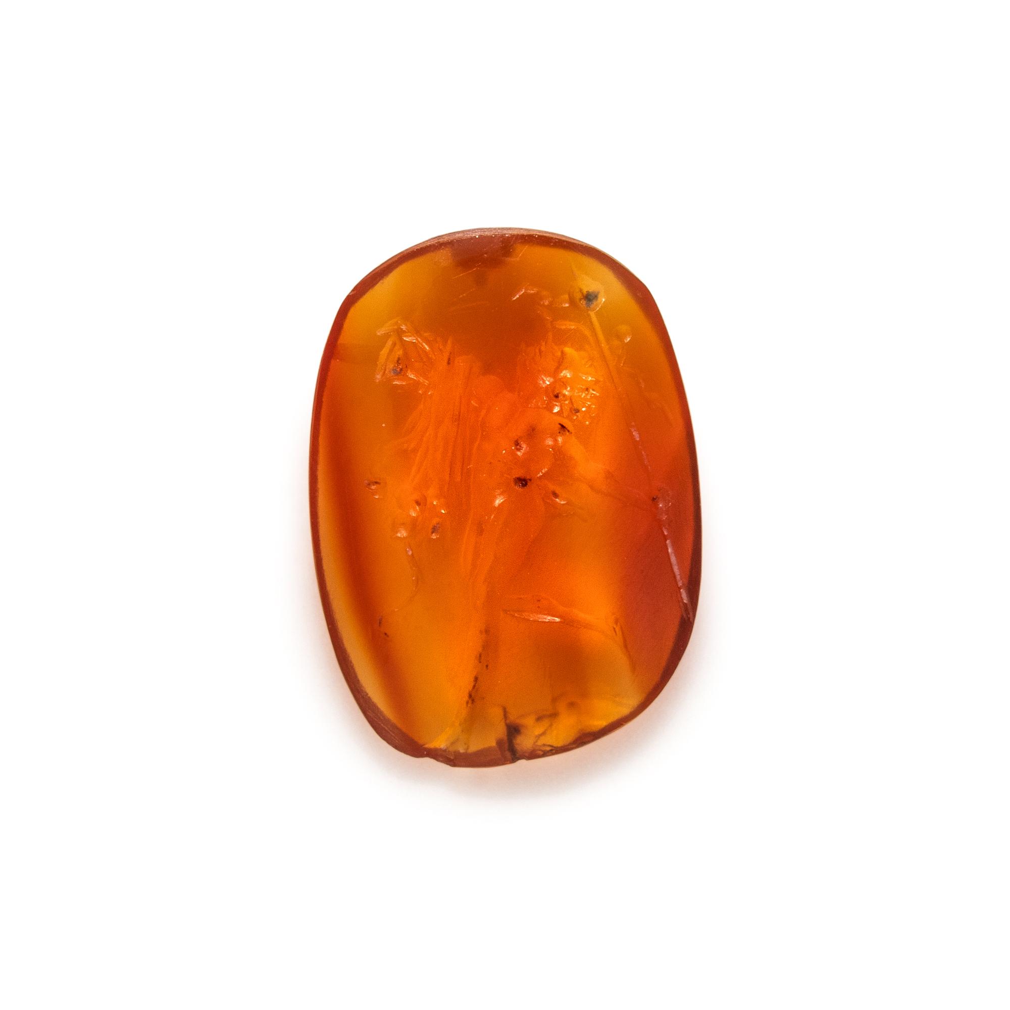 A Roman Carnelian Intaglio with a Dancing Satyr