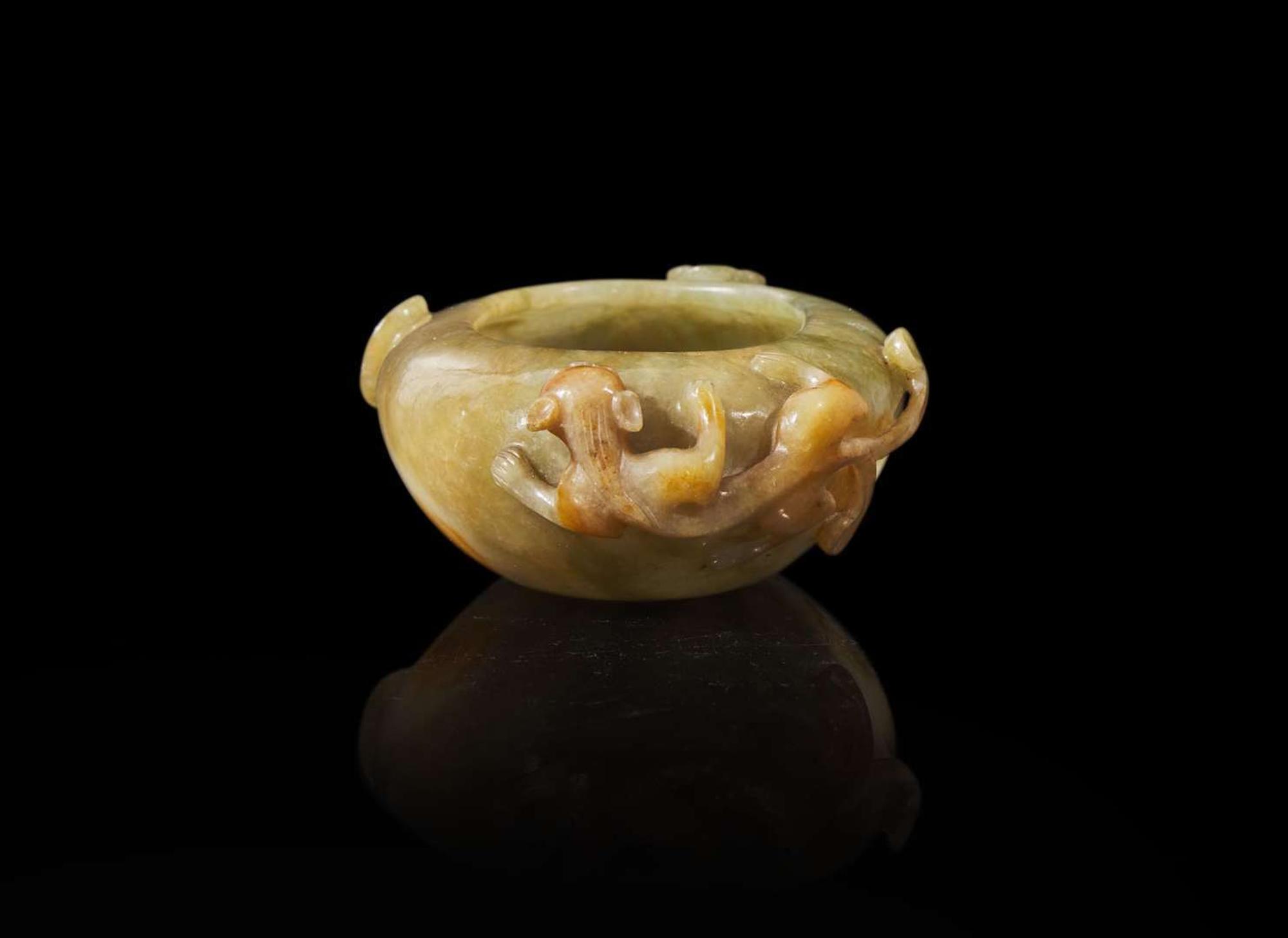 A Chinese carved jadeite "Qilongs" water coupe, Qing dynasty, 19th to early 20h century 翡翠螭龍水洗 清 十九至二十世紀初