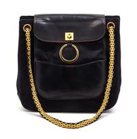 A Chanel Navy Quilted Jersey and Leather Bag, 9 x 8 1/2 x 3 inches.