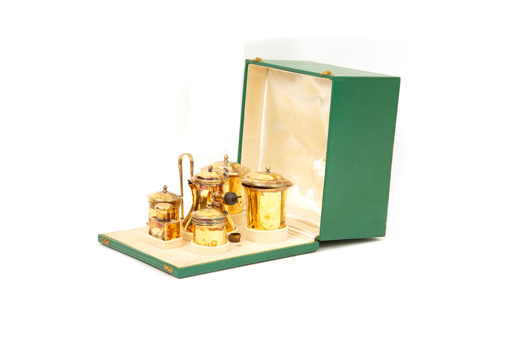 A French Silver-Gilt Six-Piece Chocolate Service