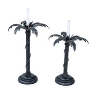 Two Matching Silvered Metal Palm Tree-form Candlesticks — 20TH CENTURY