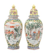 A Pair of Chinese Yellow Ground Famille Rose Hexagonal Vases and Covers