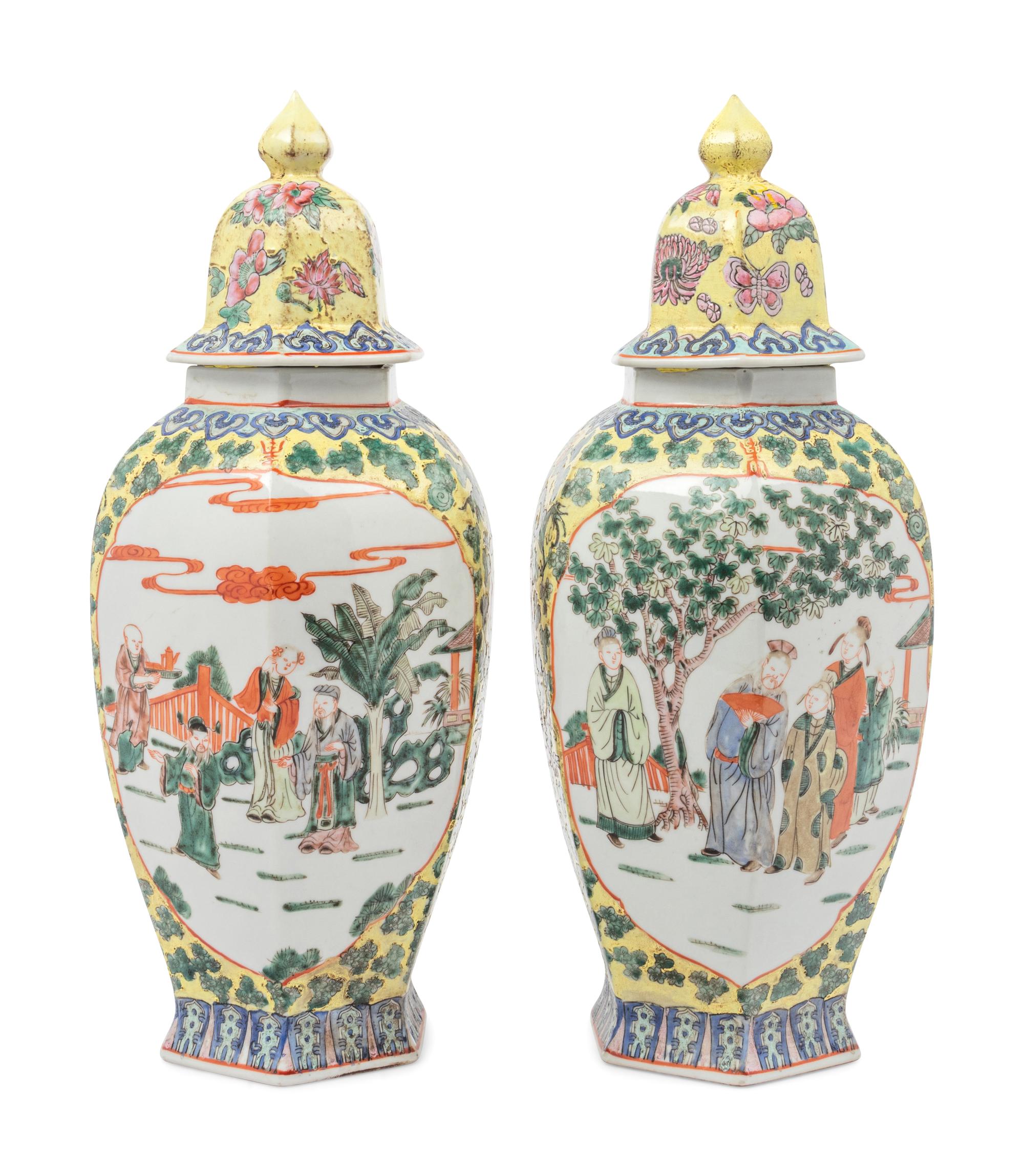 A Pair of Chinese Yellow Ground Famille Rose Hexagonal Vases and Covers