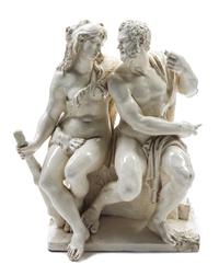 A Continental Glazed Stoneware Figural Group Height 12 1/4 inches.