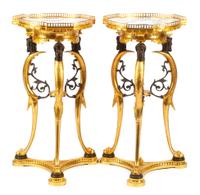 A Pair of Empire Style Gilt, Patinated Bronze and Marble Tables Height 32 x diameter of top 16 inches.