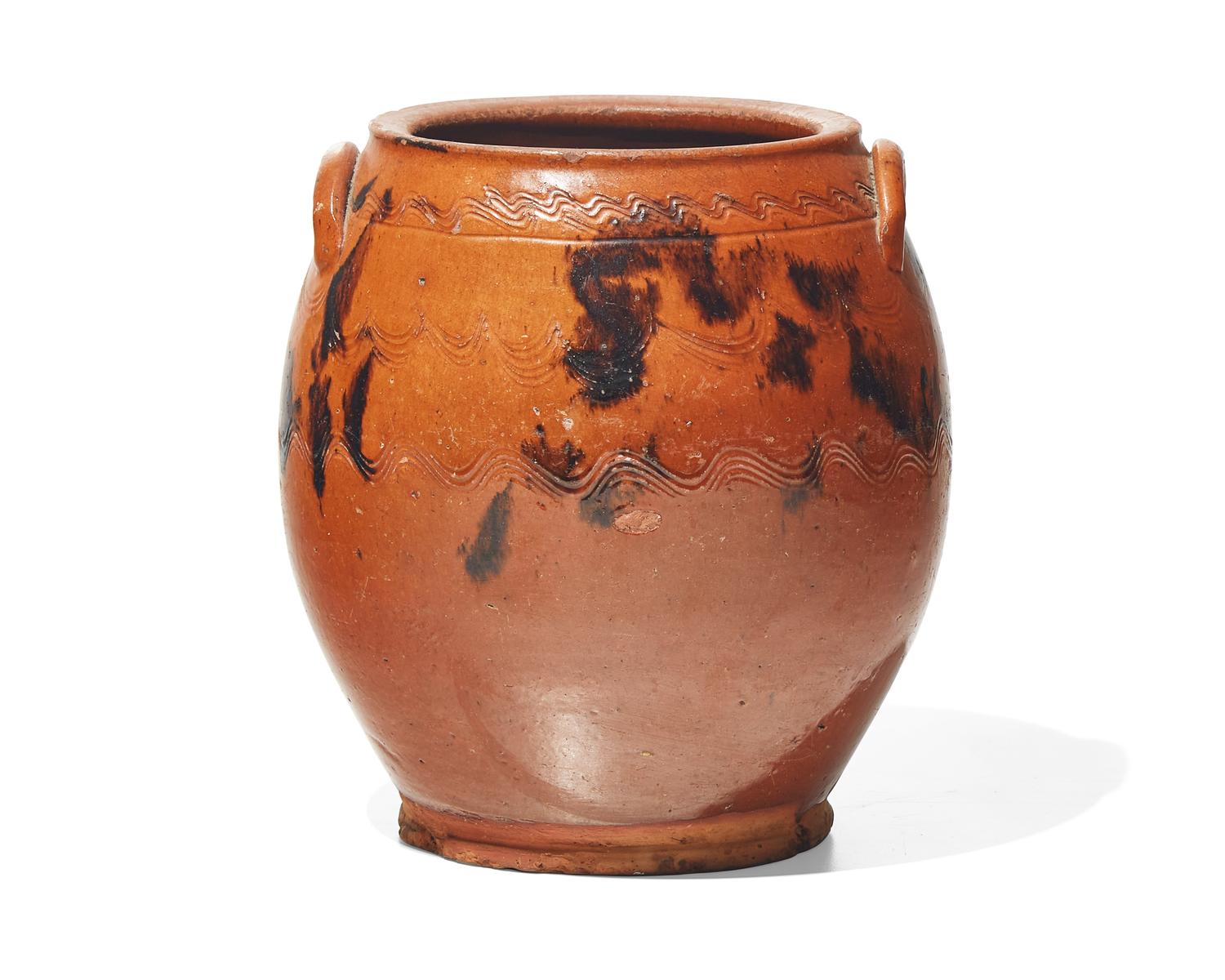 An Incised, Glazed, and Manganese-Splashed Redware Crock, 19th Century
