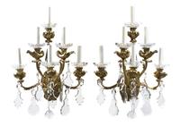 A Pair of American Brass Six-Light Wall Sconces, New Metal Craft, Height of frame 20 inches.