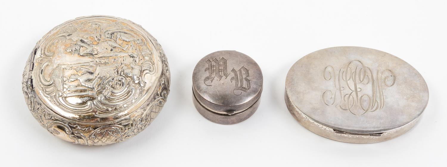 A Group of Three Silver Boxes, , comprising two examples with monograms and one oval example with classical decoration
