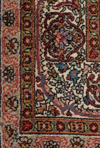 A Kirman Wool Rug