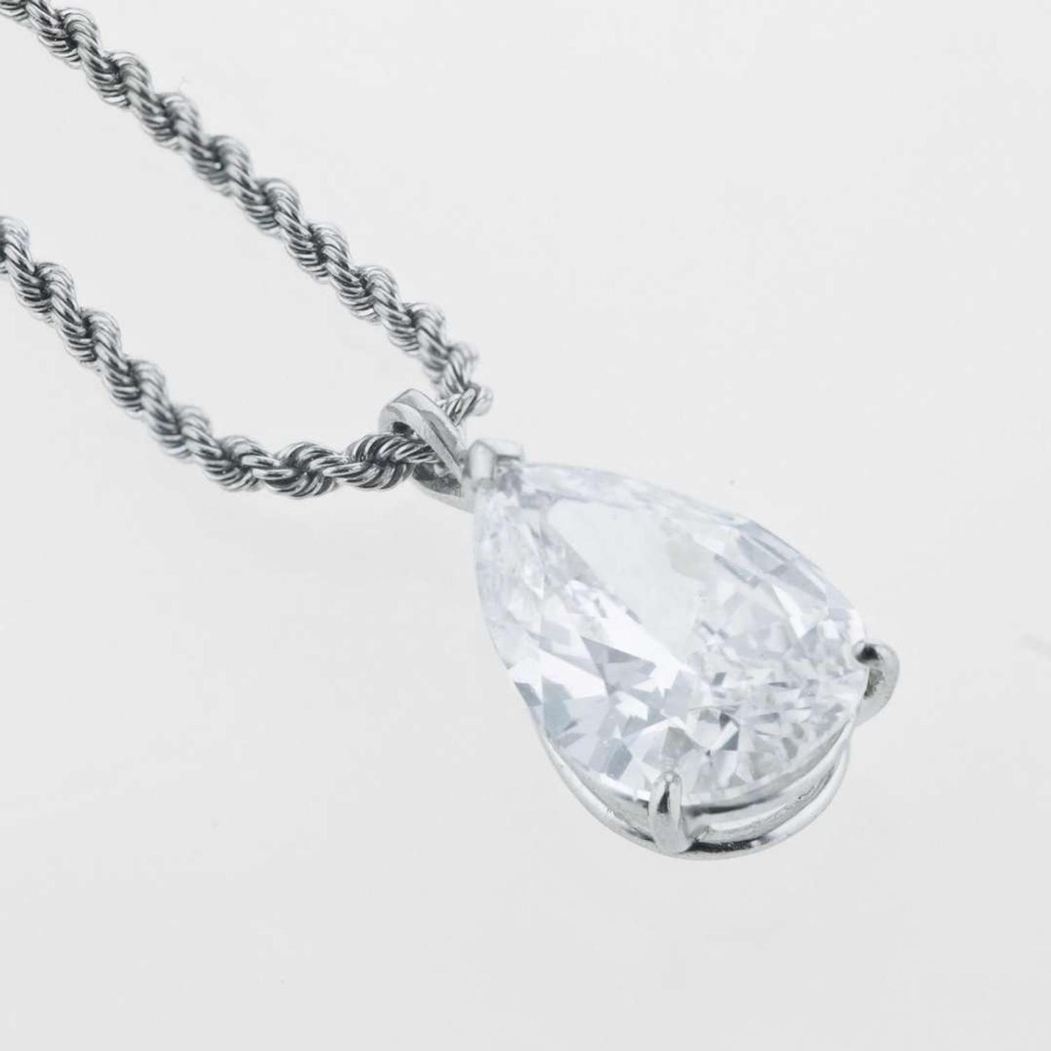 A diamond and platinum solitaire necklace