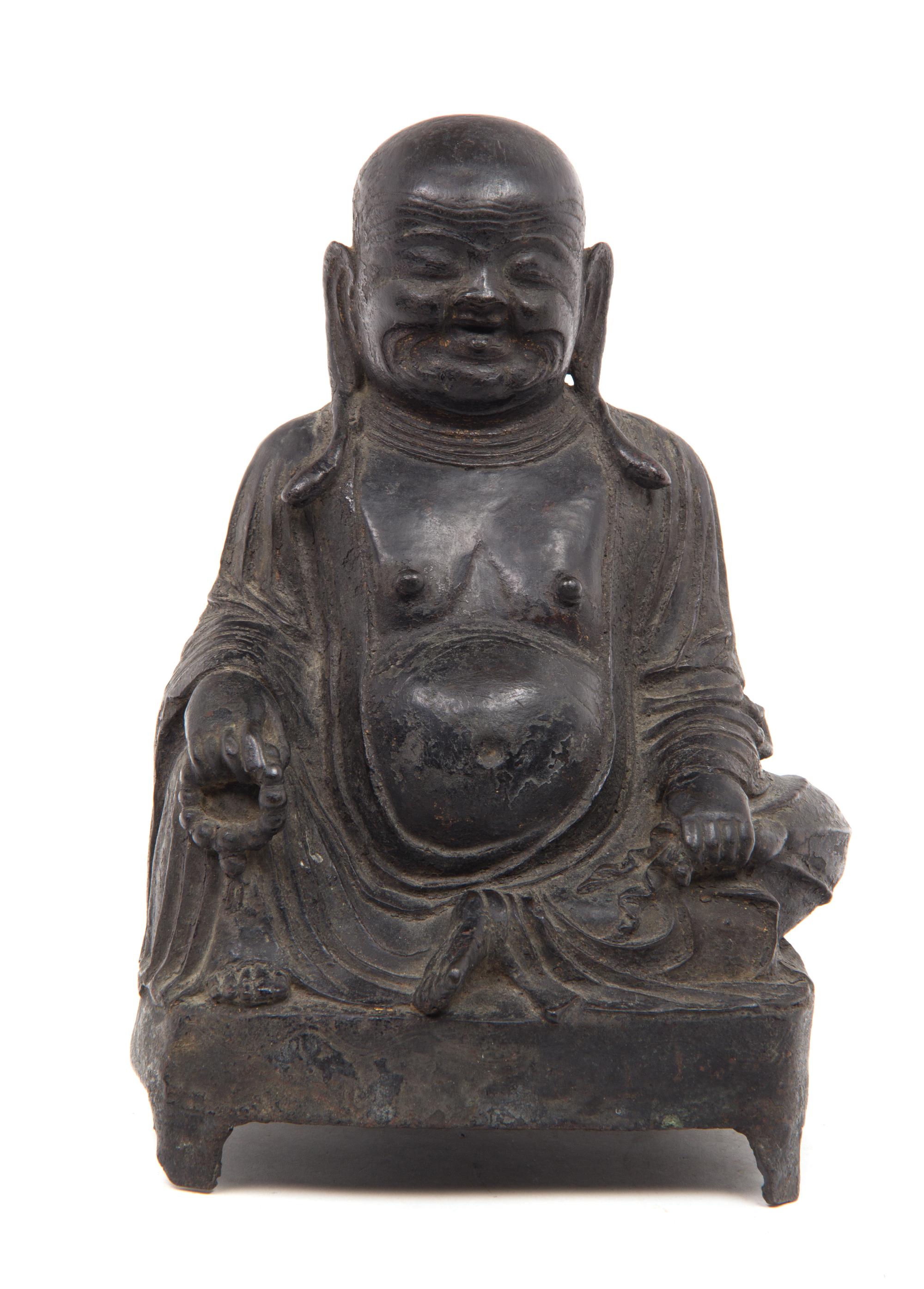 A Chinese Bronze Figure of Seated Buddha Height 9 3/4 inches. — 19TH CENTURY