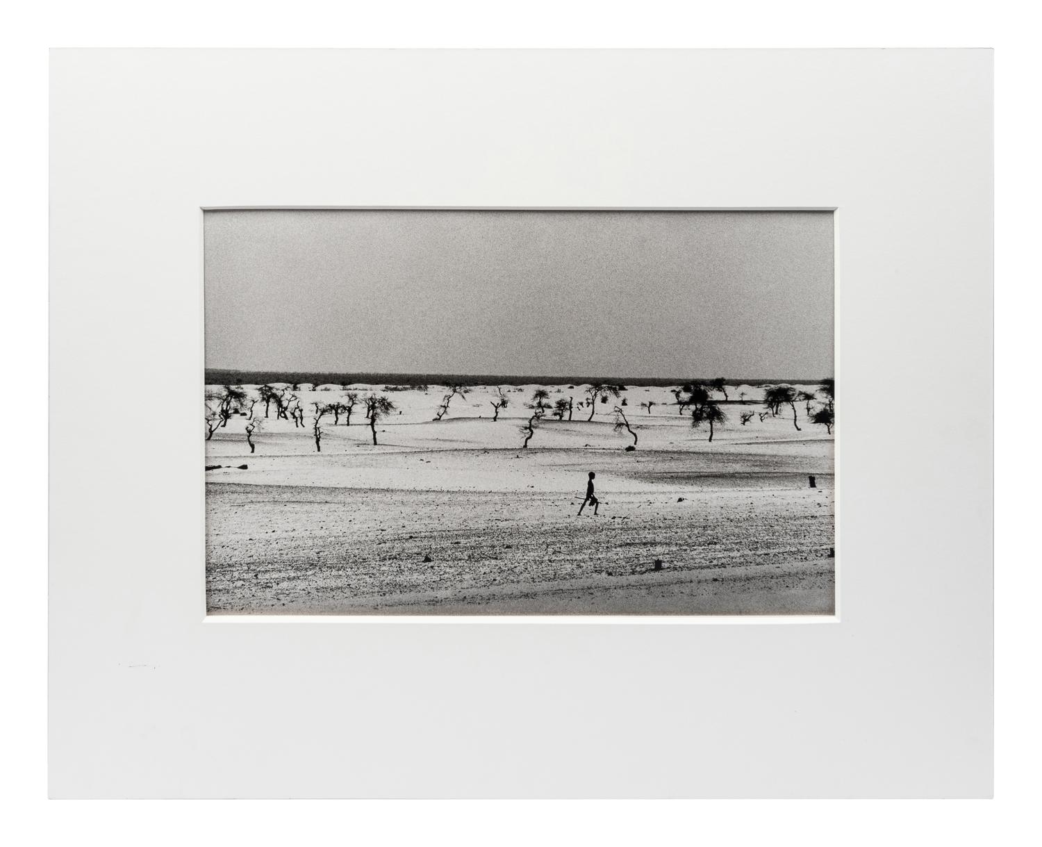 Sebastião Salgado (born 1944) This used to be the large Lake Faguibine. It dried up little by little with the drought and invasion of the desert. All the men have gone, only the children, the elderly and the women remain, Mali, 1985