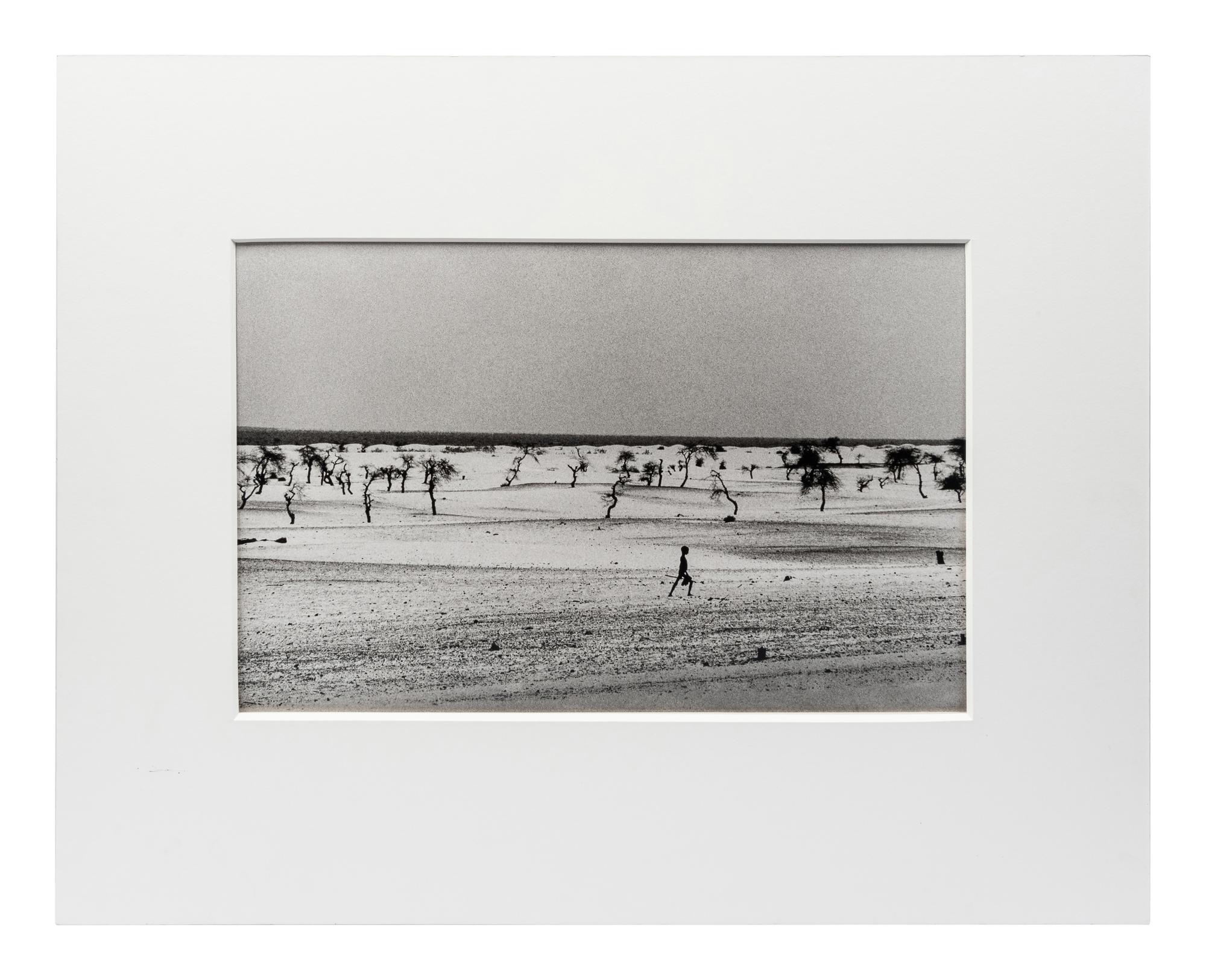 Sebastião Salgado (born 1944) This used to be the large Lake Faguibine. It dried up little by little with the drought and invasion of the desert. All the men have gone, only the children, the elderly and the women remain, Mali, 1985