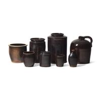 A Group of Eight Albany Glazed Redware Items