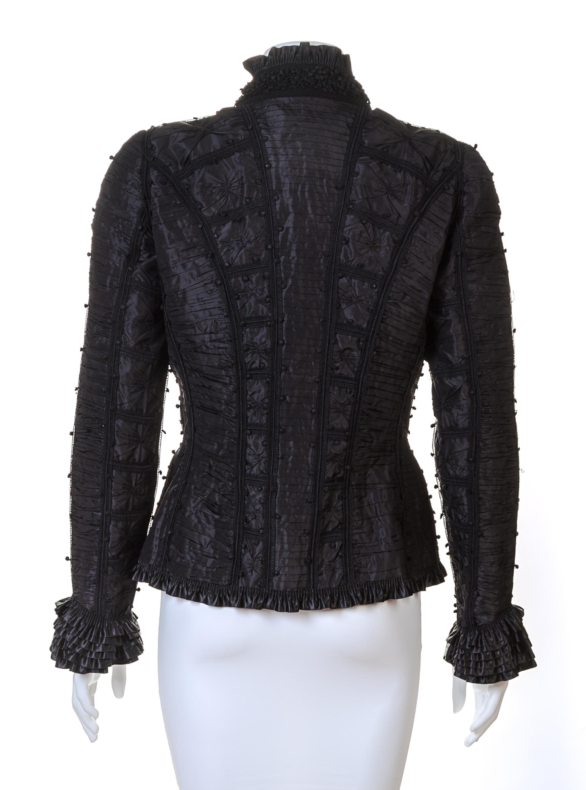 An Oscar de la Renta Black Silk Ruched Evening Jacket, Size 8.