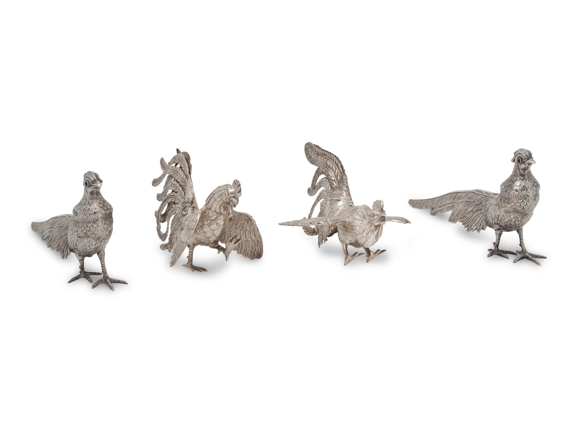 A Group of Four Silver Ornithological Table Ornaments