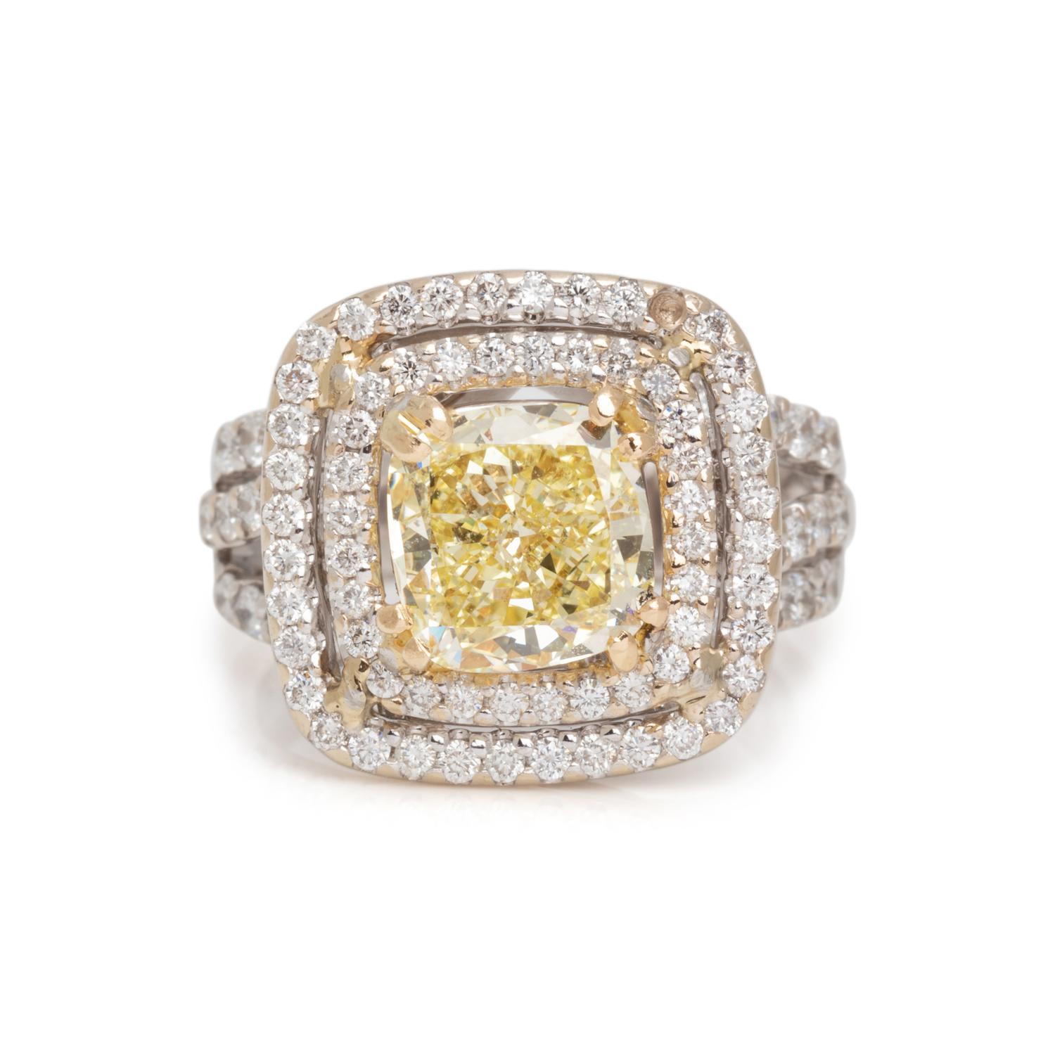 FANCY YELLOW DIAMOND AND DIAMOND RING