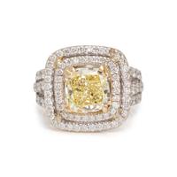 FANCY YELLOW DIAMOND AND DIAMOND RING