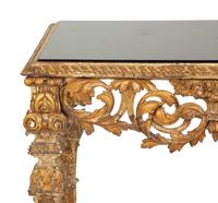 A Regence Style Giltwood Console Table with Black Glass Inset Top