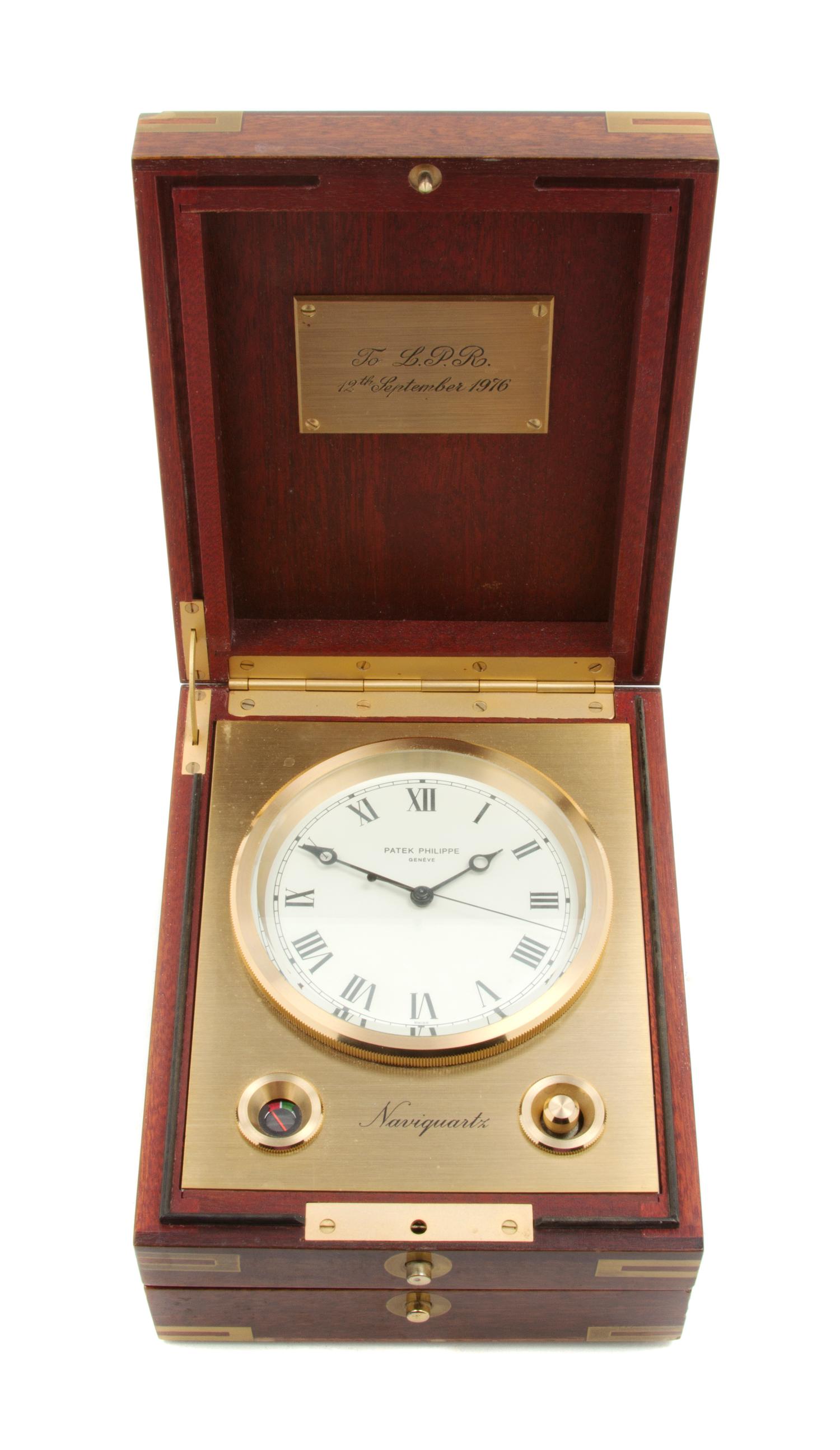A Patek Philippe Brass and Mahogany Electronic Marine Chronometer, Naviquartz, Diameter of dial 3 1/4 inches.