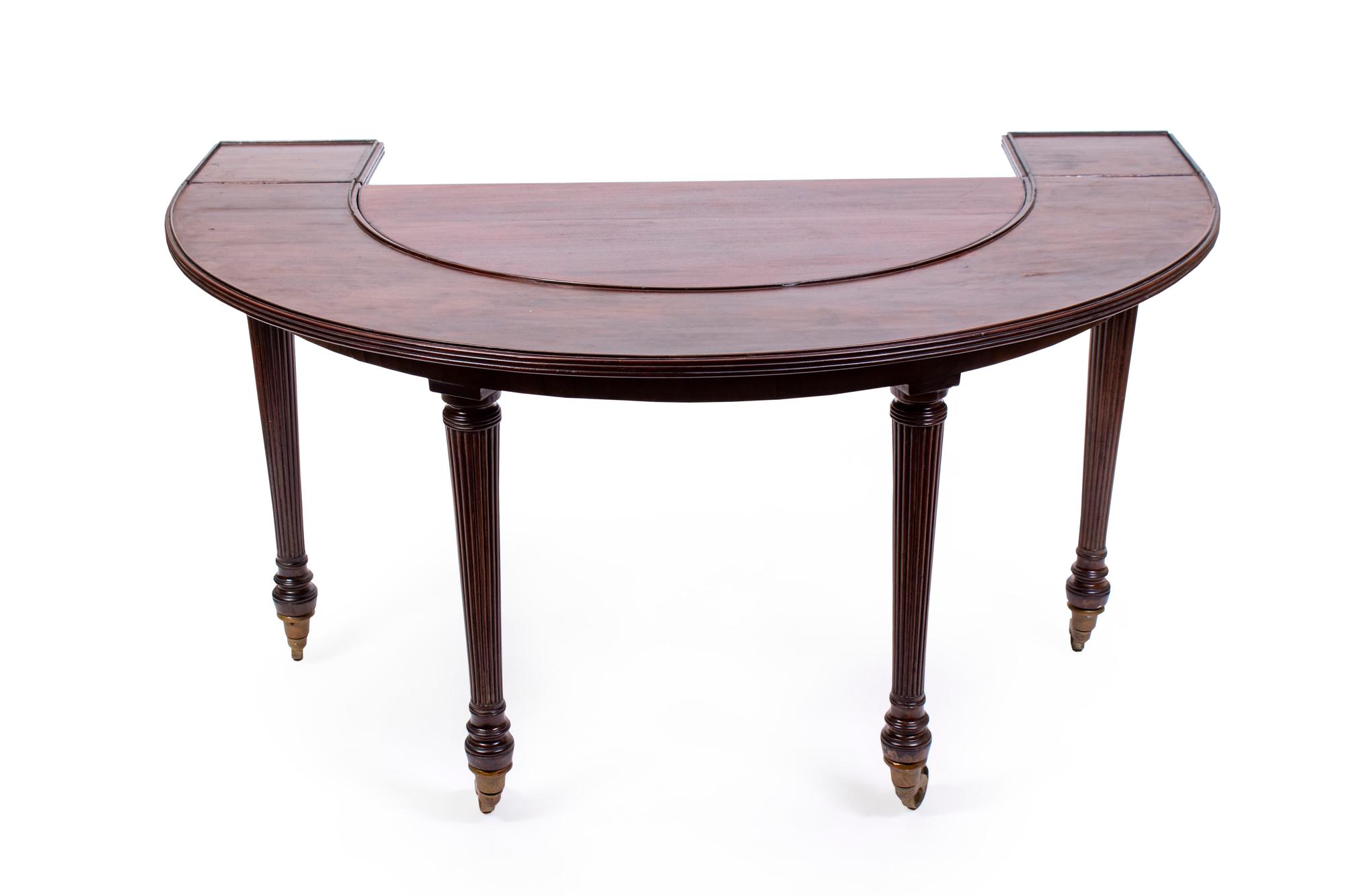 A Regency Mahogany Hunt Table — IN THE STYLE OF GILLOWS OF LANCASTER, 19TH CENTURY