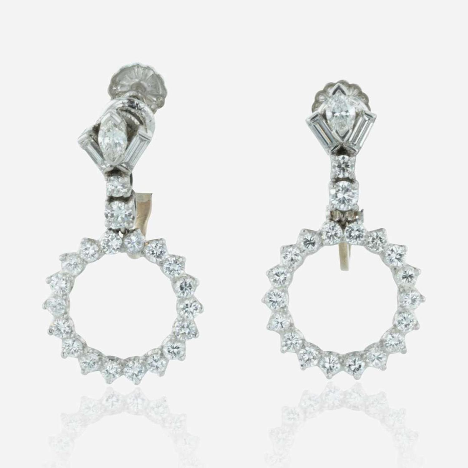 A Set of 14K White Gold and Diamond Earrings and Necklace