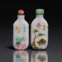 Two Chinese Yangzhou School Glass Overlay Snuff Bottles, Second Half 19th Century 清晚期 涅白地套五色料鼻烟壺兩支
