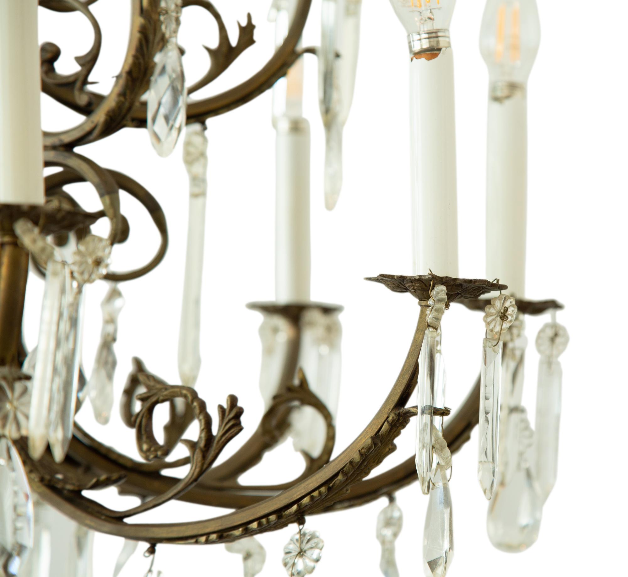 A Continental Gilt Bronze and Glass Twelve-Light Two-Tier Chandelier