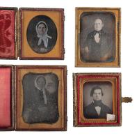 [EARLY PHOTOGRAPHY]. A group of 29 daguerreotypes featuring people with eyeglasses, including: