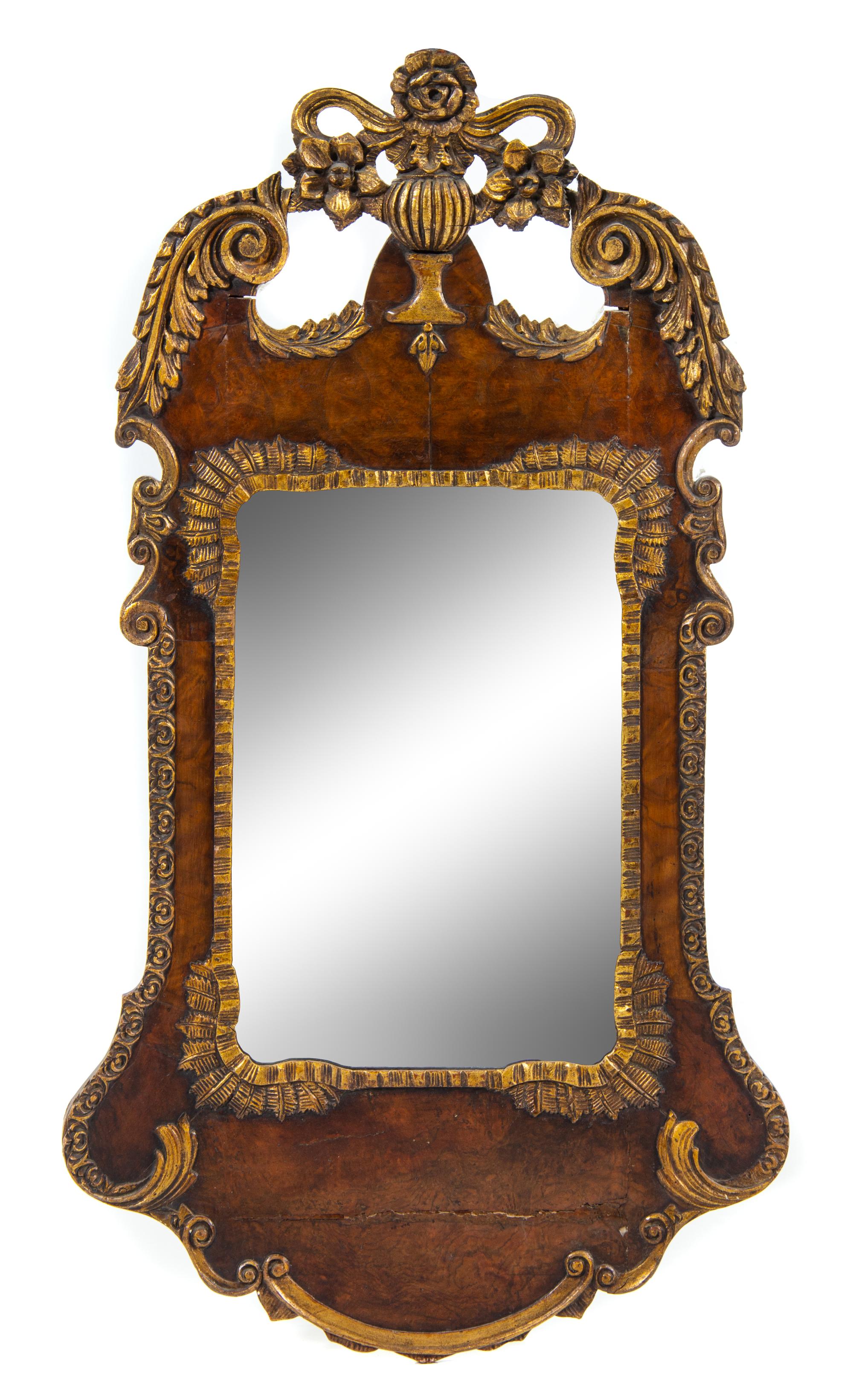 A George III Style Parcel Gilt Mirror