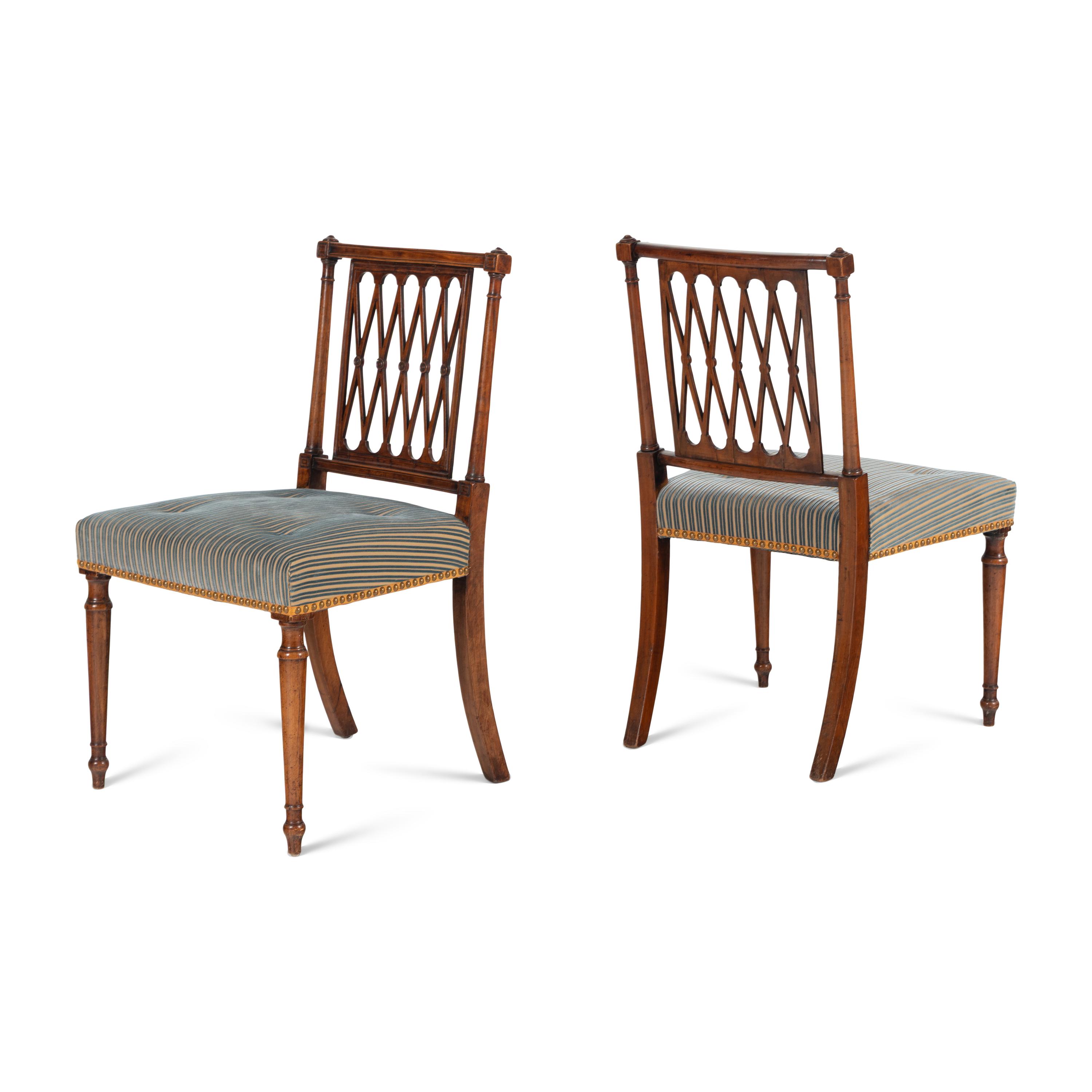 A Set of Eight George III Mahogany Lattice-Back Dining Chairs