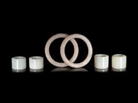 Four Chinese Celadon Archer's Rings and Two White Jade Bangles