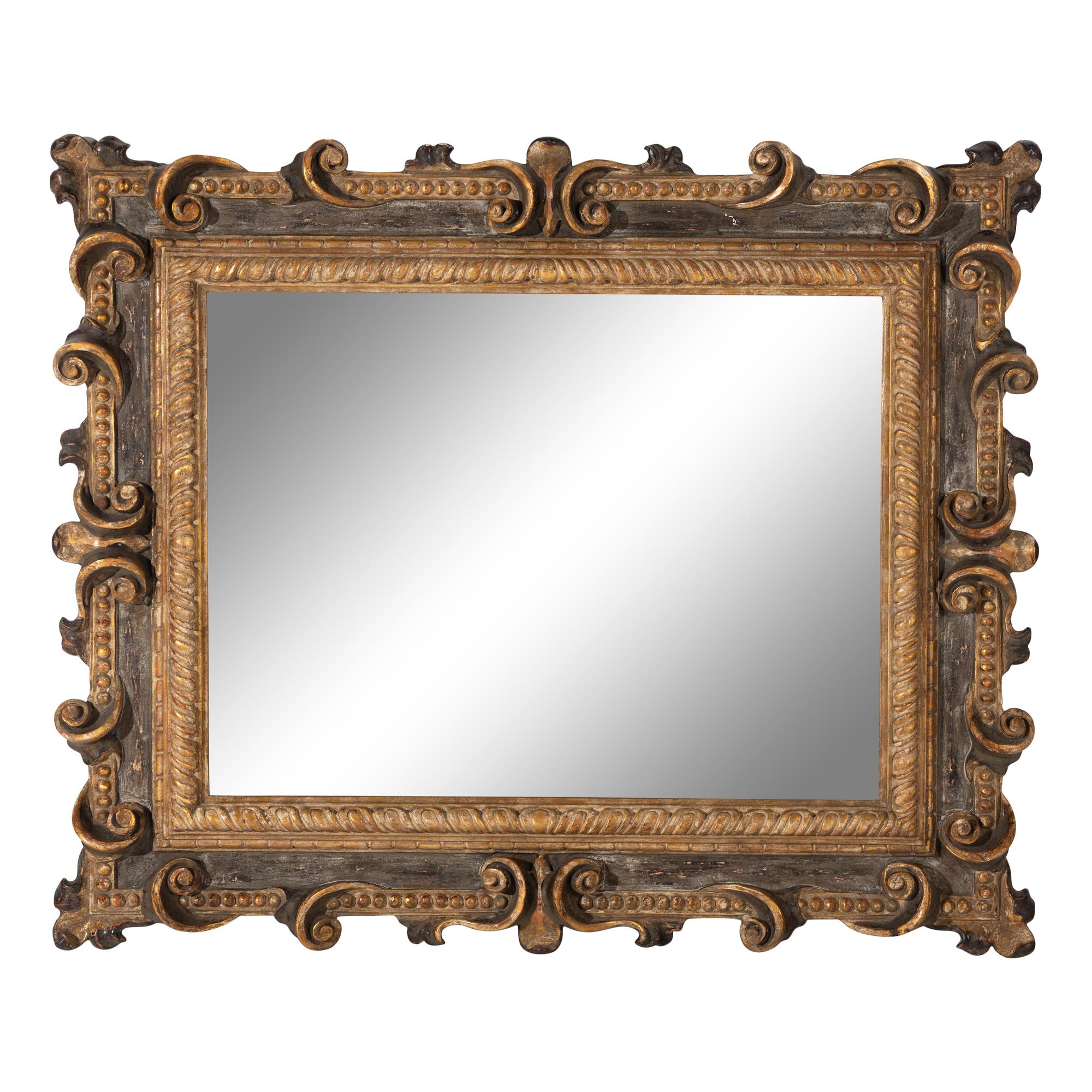 An Italian Baroque Style Parcel Gilt and Paint Decorated Mirror