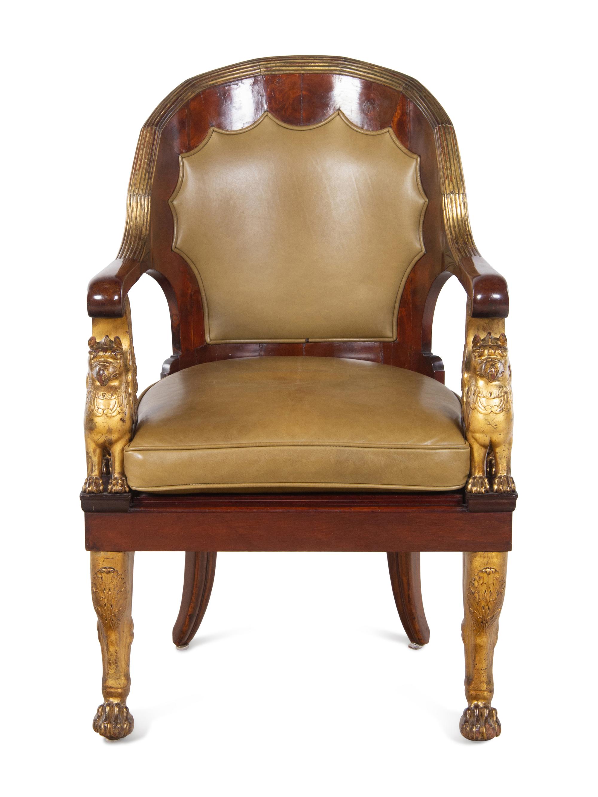 An Empire Parcel Gilt Mahogany Fauteuil
