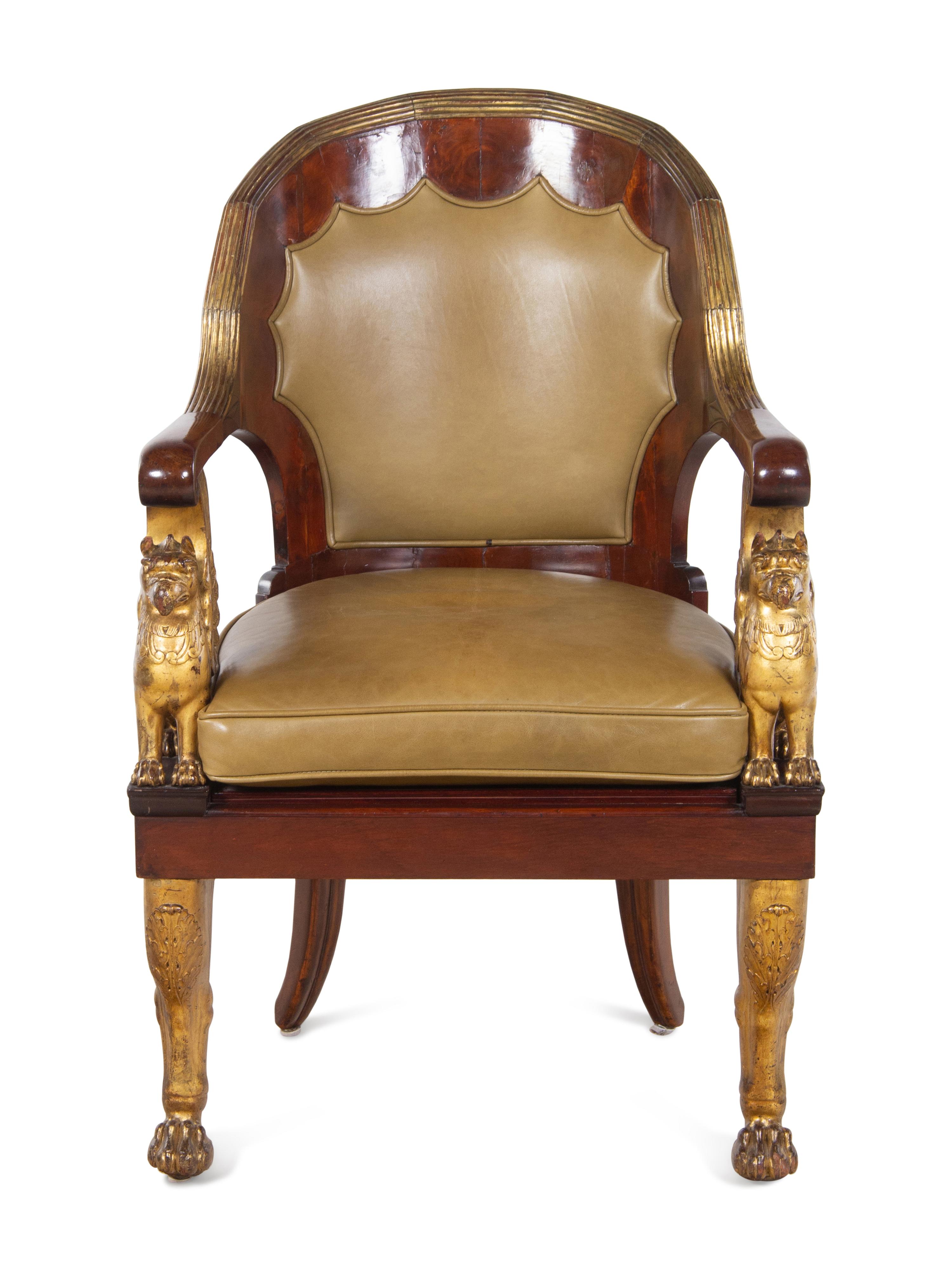 An Empire Parcel Gilt Mahogany Fauteuil