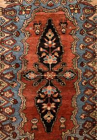 A Fereghan Mat and a Sarouk Mat