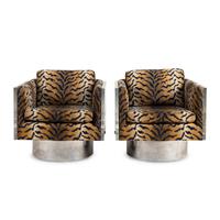 A Pair of Acrylic Swiveling Armchairs
