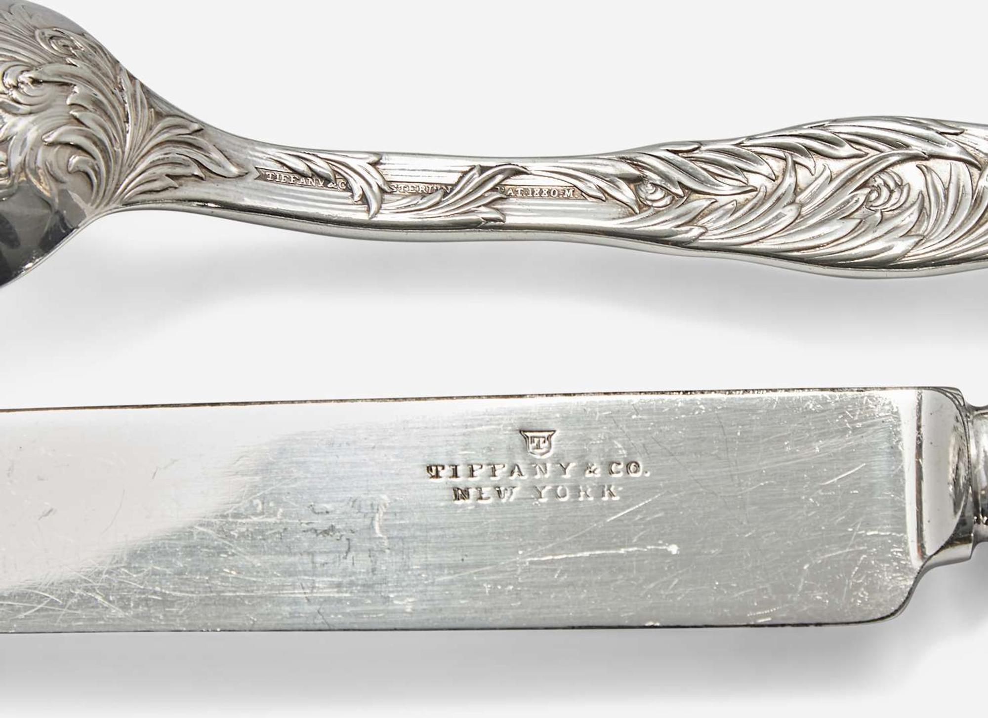 A sterling silver flatware service for eighteen in the "Indian Chrysanthemum" pattern, Tiffany & Co., New York, NY, circa 1880