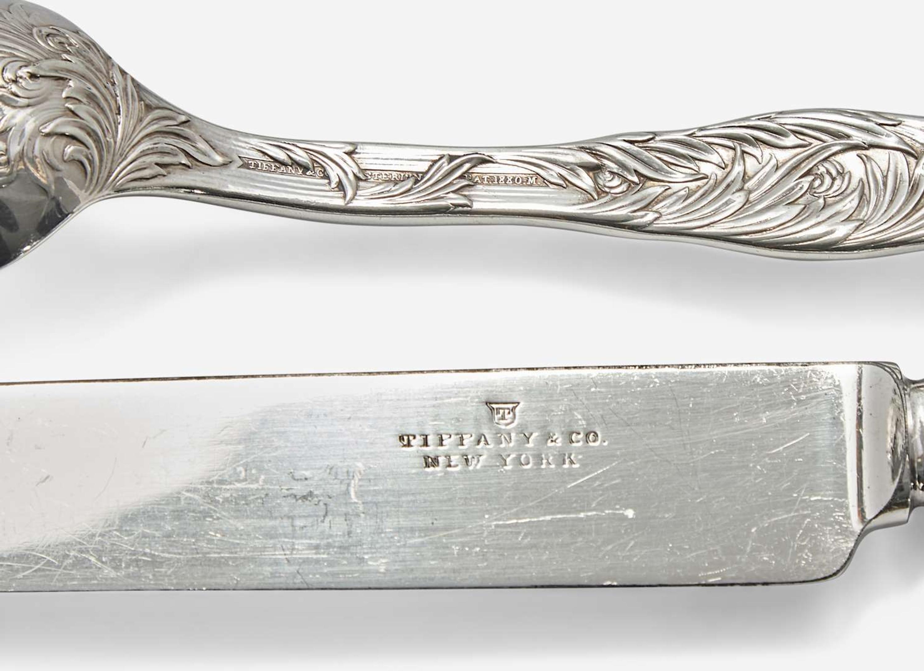 A sterling silver flatware service for eighteen in the "Indian Chrysanthemum" pattern, Tiffany & Co., New York, NY, circa 1880