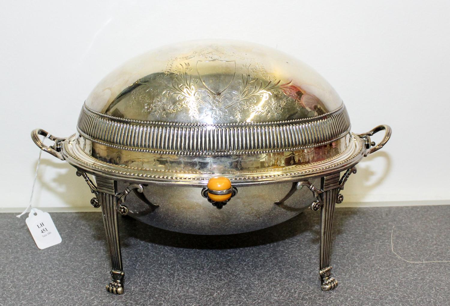 An American Silver-Plate Bacon Warmer. Height 8 1/4 x length 13 1/2 x width 8 inches.