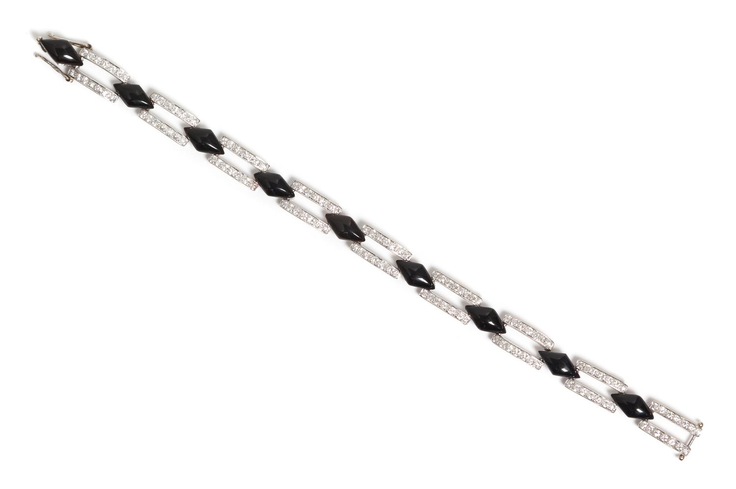 A White Gold, Diamond and Onyx Bracelet, 10.50 dwts.