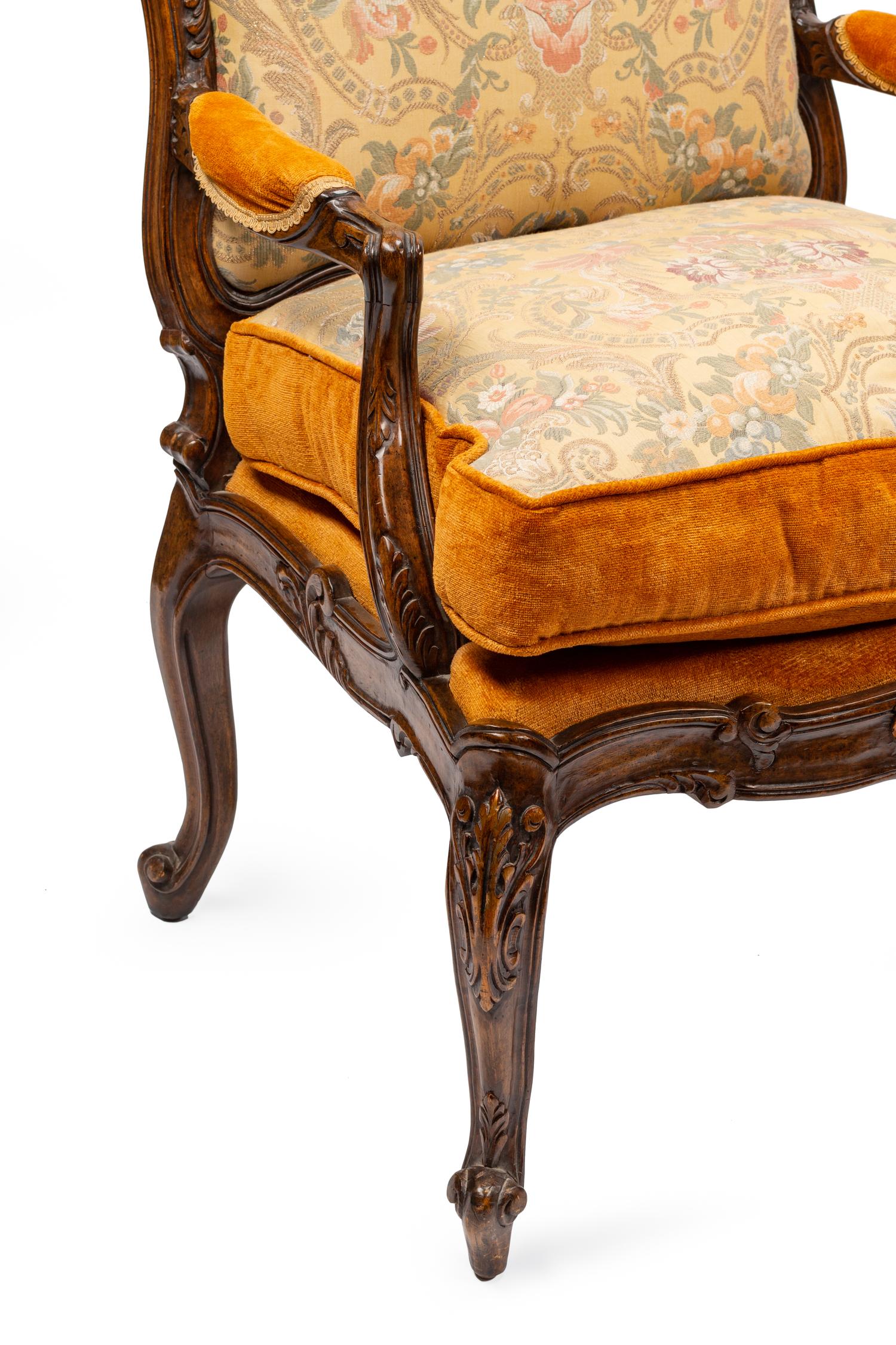 A Pair of Louis XV Style Walnut Fauteuils