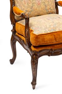 A Pair of Louis XV Style Walnut Fauteuils