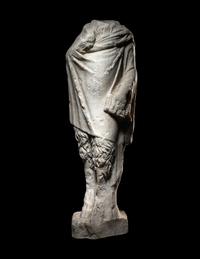 A Roman Marble Statue of Pan Holding Pipes